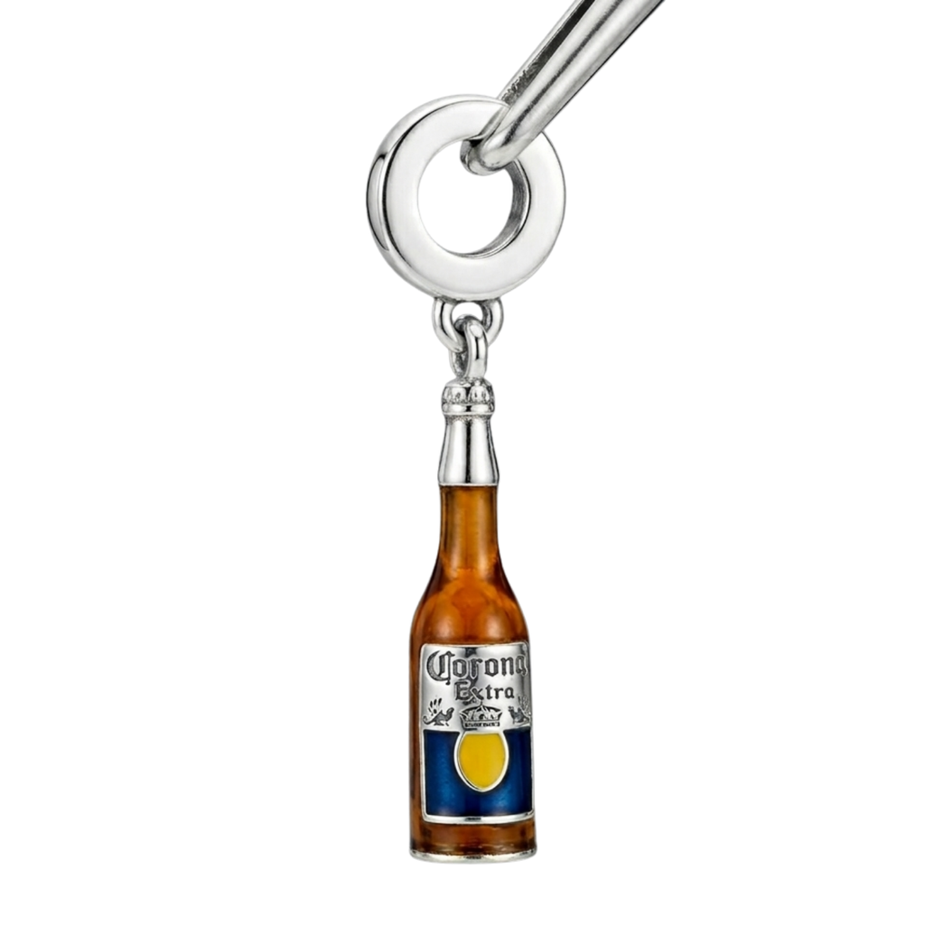 Charm shaped like a beer bottle with a label on a white background