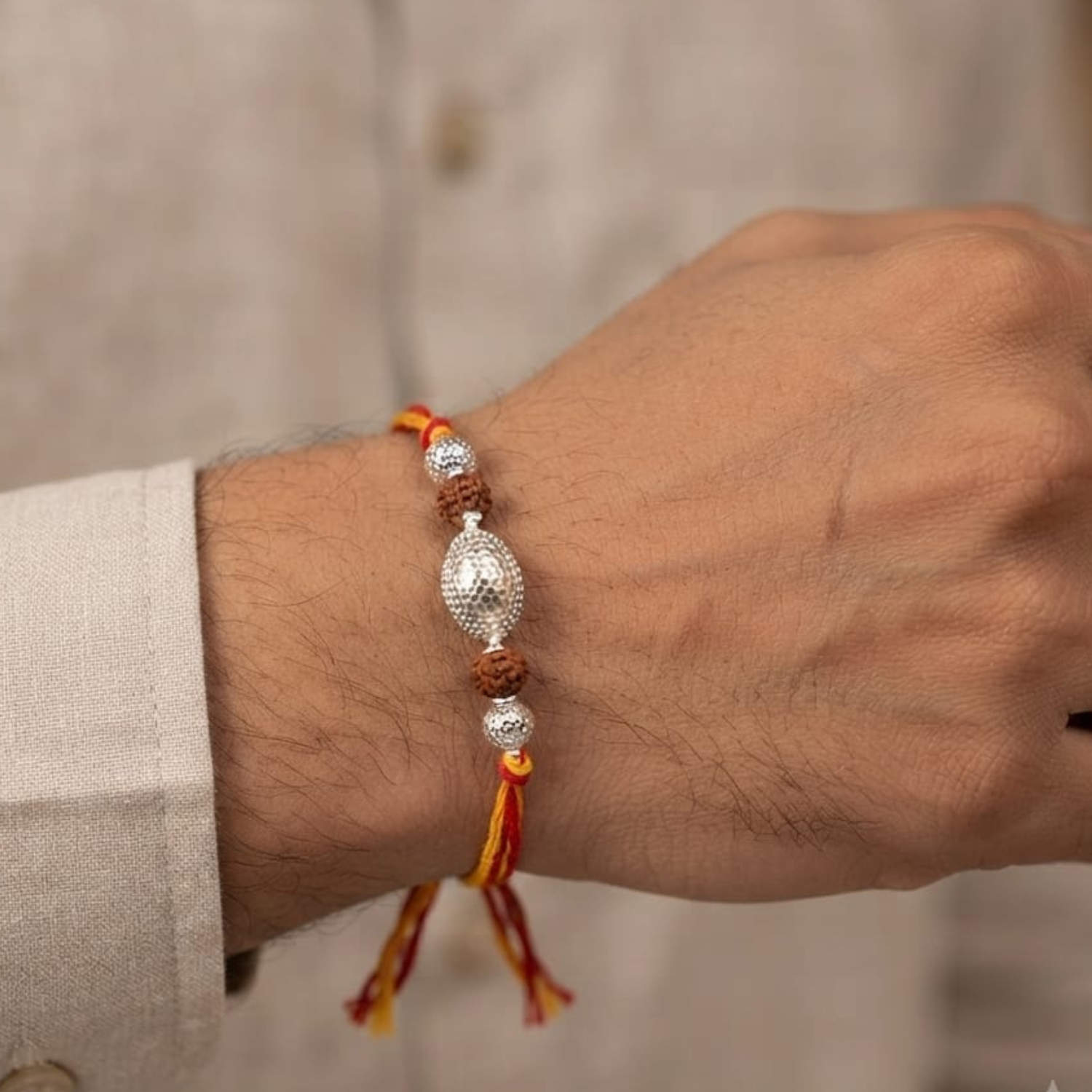 925 Silver Rudraksha Rakhi with Oval Silver Bead