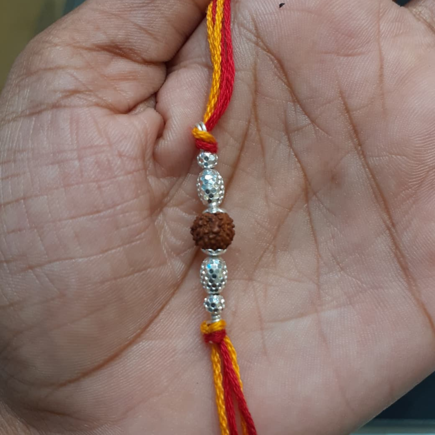925 Silver Rudraksha Rakhi with Hammered Beads